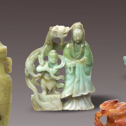 CHINA - 19th century. Green and brown jade...
