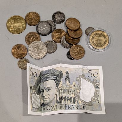 A set of demonetized coins and a French fifty...