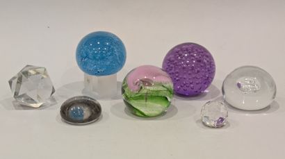 A set of paperweight balls in bubble glass...