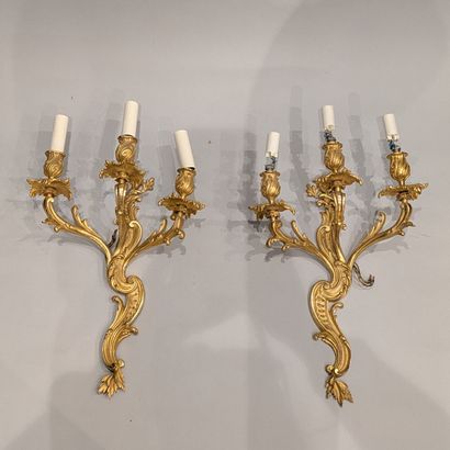 Pair of large ormolu wall sconces with foliage...