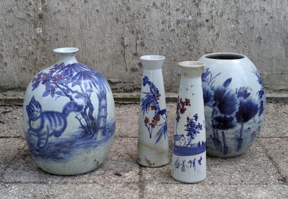 Four porcelain vases, one pair bottle-shaped,...