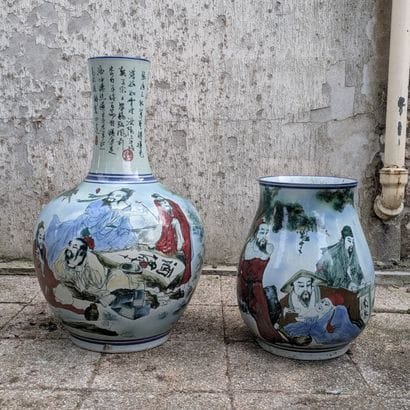 Two porcelain vases, bottle-shaped and ovoid,...