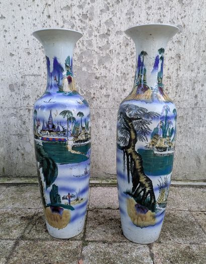 Two large porcelain baluster vases with polychrome...