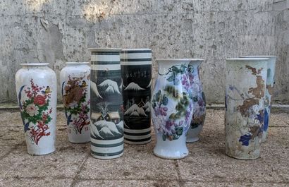 Eight porcelain matching vases decorated...