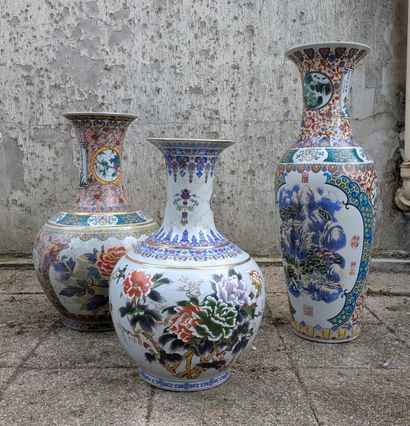 Set of three porcelain baluster vases, some...