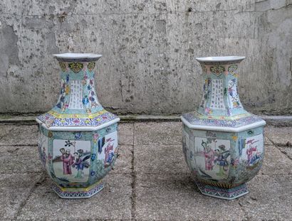 Pair of hexagonal baluster vases with polychrome...