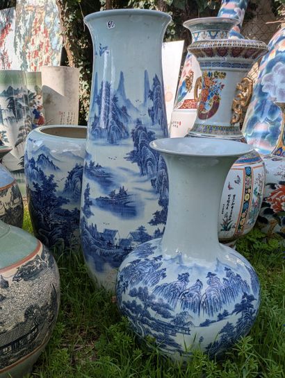 Set of three porcelain vases, one tapered,...