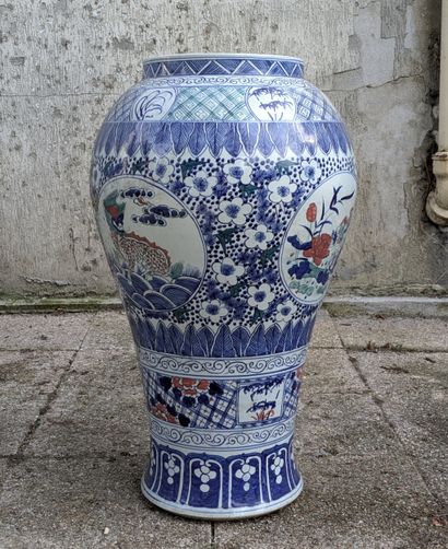Porcelain baluster vase decorated in blue...