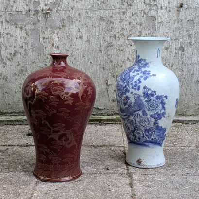 Two porcelain vases, one baluster-shaped...