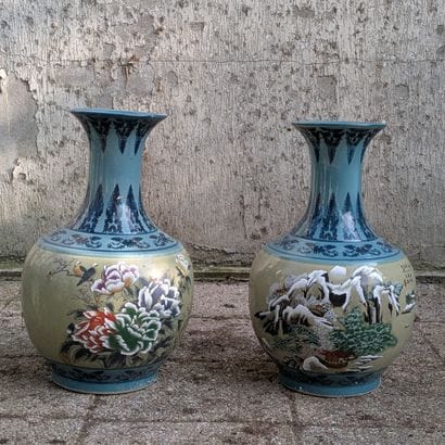 Two globular baluster vases decorated with...
