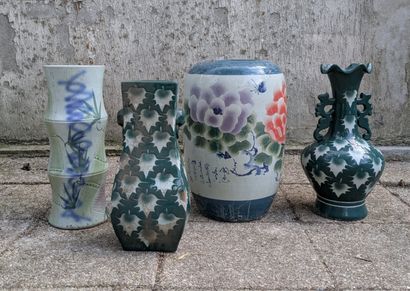 Set of four porcelain vases, two decorated...