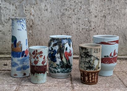 Five porcelain vases of various shapes decorated...