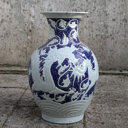 Celadon porcelain globular and baluster vase...