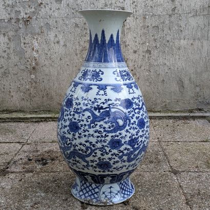 Porcelain piriform vase on a heel, decorated...