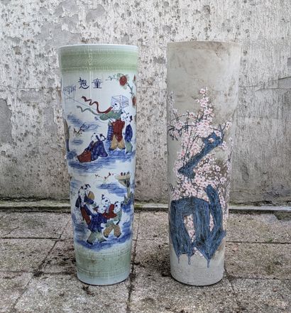 Pair of porcelain horn vases, one decorated...