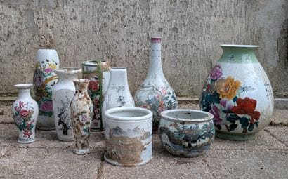 Set of ten porcelain vases of various shapes...