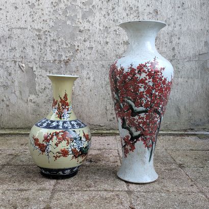 Two porcelain vases, one baluster, the other...