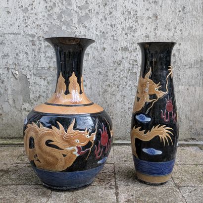 Two porcelain vases, one baluster, the other...