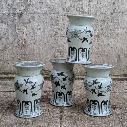 Suite of four porcelain baluster stools with...
