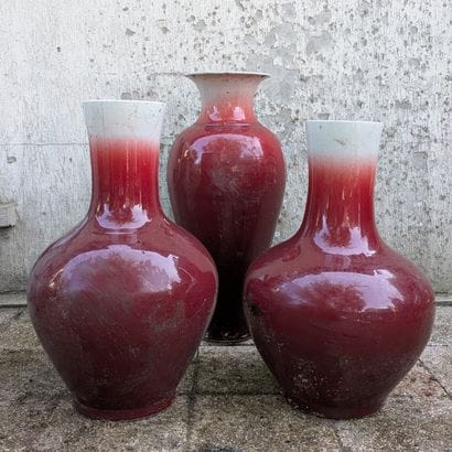 Paire de vases balustres et un autre, en...