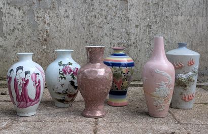 Six porcelain vases of various shapes decorated...