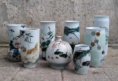 Eight porcelain vases of various shapes,...