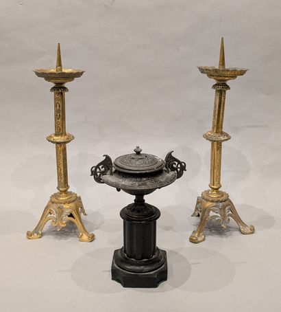 Pair of gilded metal church candlesticks...