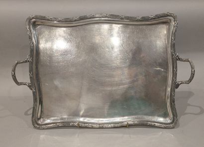 Large serving platter with handles, the contoured...