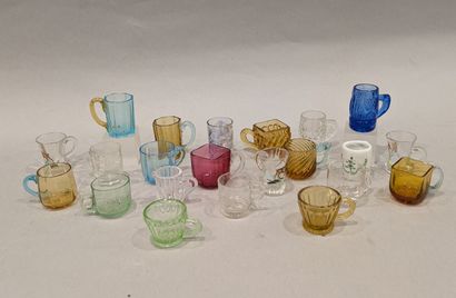 Twenty-two clear glass (one porcelain) liqueur...
