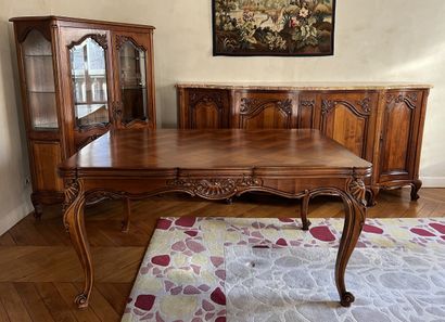 Dining room in fruitwood molded with shells...