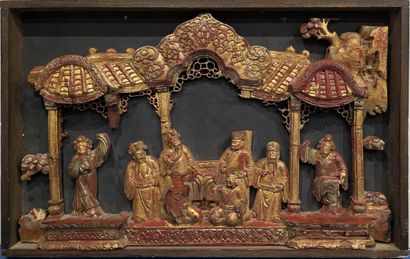 Carved wood element, lacquered in red and...
