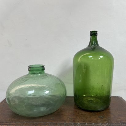 *Large flat-bottomed carboy in green-tinted...