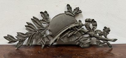 *Commemorative element in patinated metal...