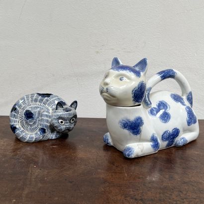 *Two blue enameled porcelain cats, reproductions...