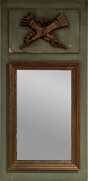 A small mirror with a green lacquered wood...