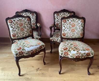 Pair of walnut armchairs and chairs, molded...