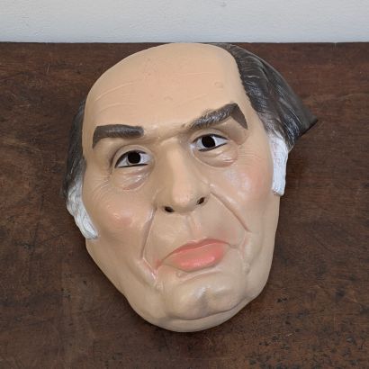 *Caricature mask of François Mitterrand in...