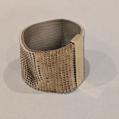 Daniel SWAROVSKI. Cuff bracelet with gilded...