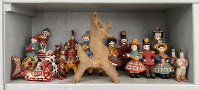 *A set of painted terracotta figurines as...