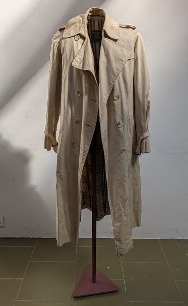 *Burberry. Beige canvas raincoat, lined....