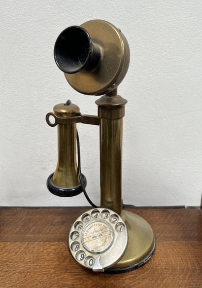 *Replica of an old brass candlestick telephone....