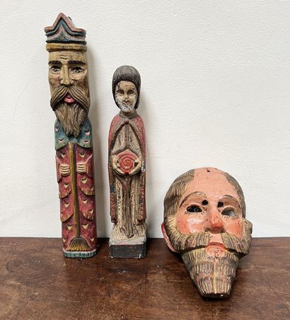*Two sculptures and a mask in polychrome...