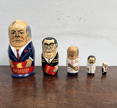 *Suite of polychrome wooden matryoshkas:...