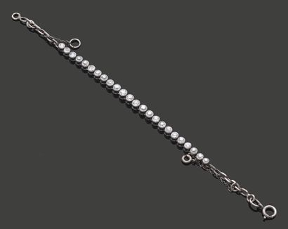 Bracelet en or gris 18K (750) ou platine,...