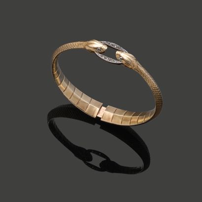 Bracelet jonc ouvrant en or jaune 18K (750)...