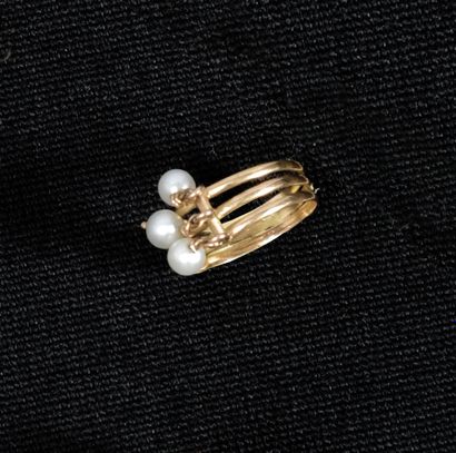 Bague en or jaune 14K (585), formée de trois...