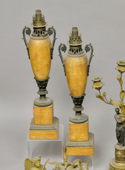Pair of oil lamps in patinated metal and...