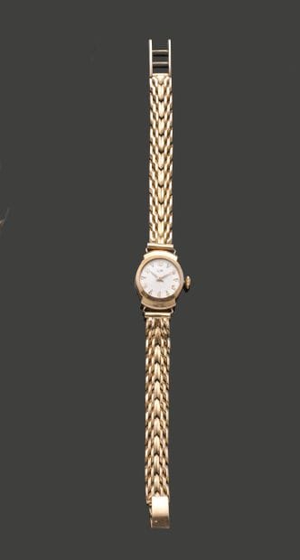 Montre de dame en or jaune 18K (750), le...