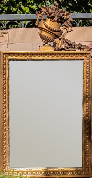 Mirror with gilded wood surround, decorated...