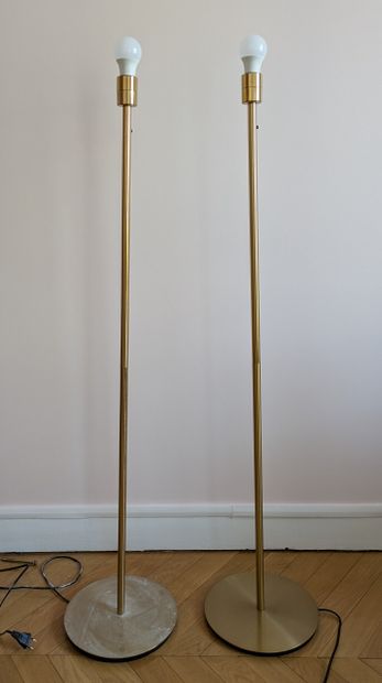 Two varnished brass floor lamps.
